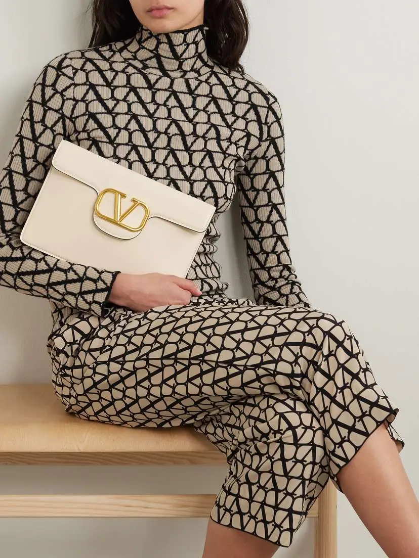 Valentino Garavani Locò Leather Clutch | Thumbnail 2 Valentino Garavani Locò Leather Clutch | Thumbnail 2