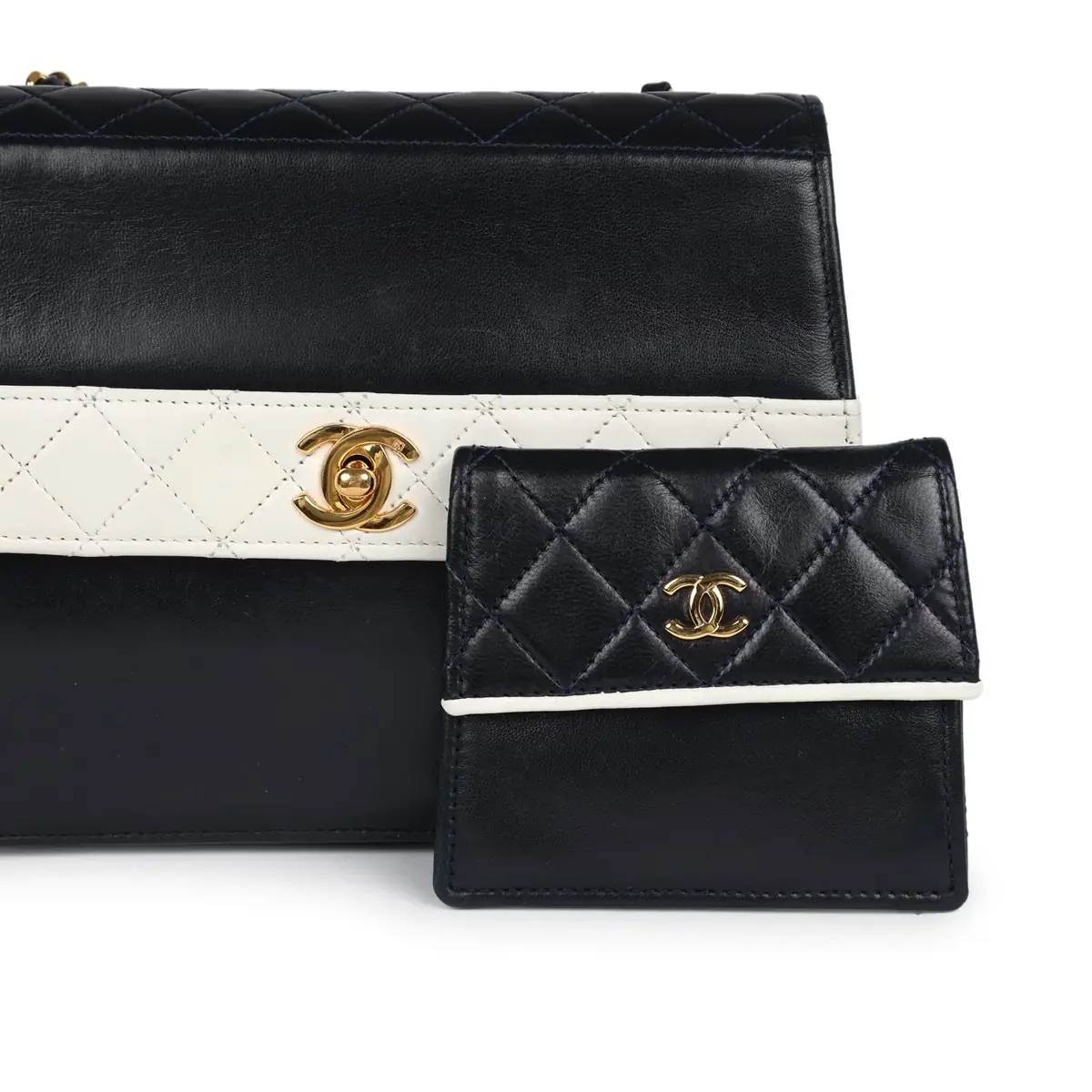 Chanel Vintage Chanel Trapezoid Flap Bag Navy and White Lambskin Gold Hardware | Thumbnail 7 Chanel Vintage Chanel Trapezoid Flap Bag Navy and White Lambskin Gold Hardware | Thumbnail 7