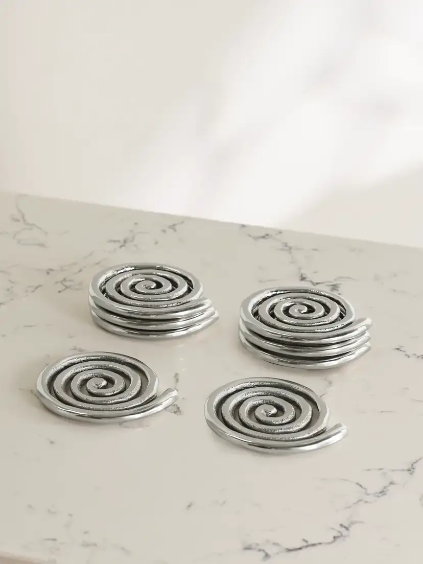 Sophie Lou Jacobsen + Etagere Spiral Set Of Eight Nickel-plated Coasters | Image 1 Sophie Lou Jacobsen + Etagere Spiral Set Of Eight Nickel-plated Coasters | Image 1