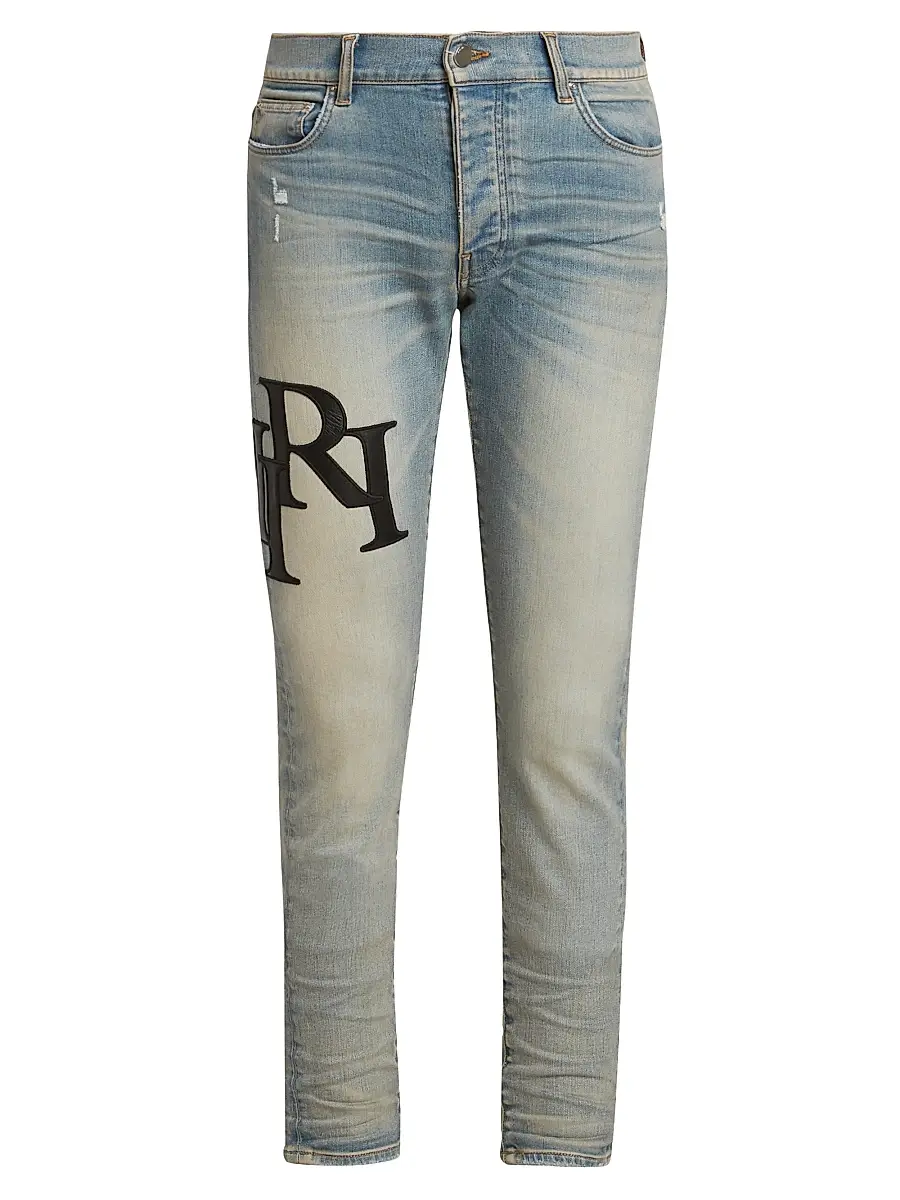 Amiri Men's Staggered Logo Skinny Jeans - Antique Indigo Black | Image 1 Amiri Men's Staggered Logo Skinny Jeans - Antique Indigo Black | Image 1