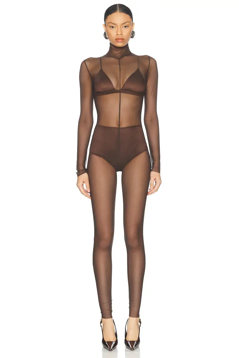 Norma Kamali Long Sleeve Slim Fit Turtleneck Catsuit | Image 1 Norma Kamali Long Sleeve Slim Fit Turtleneck Catsuit | Image 1