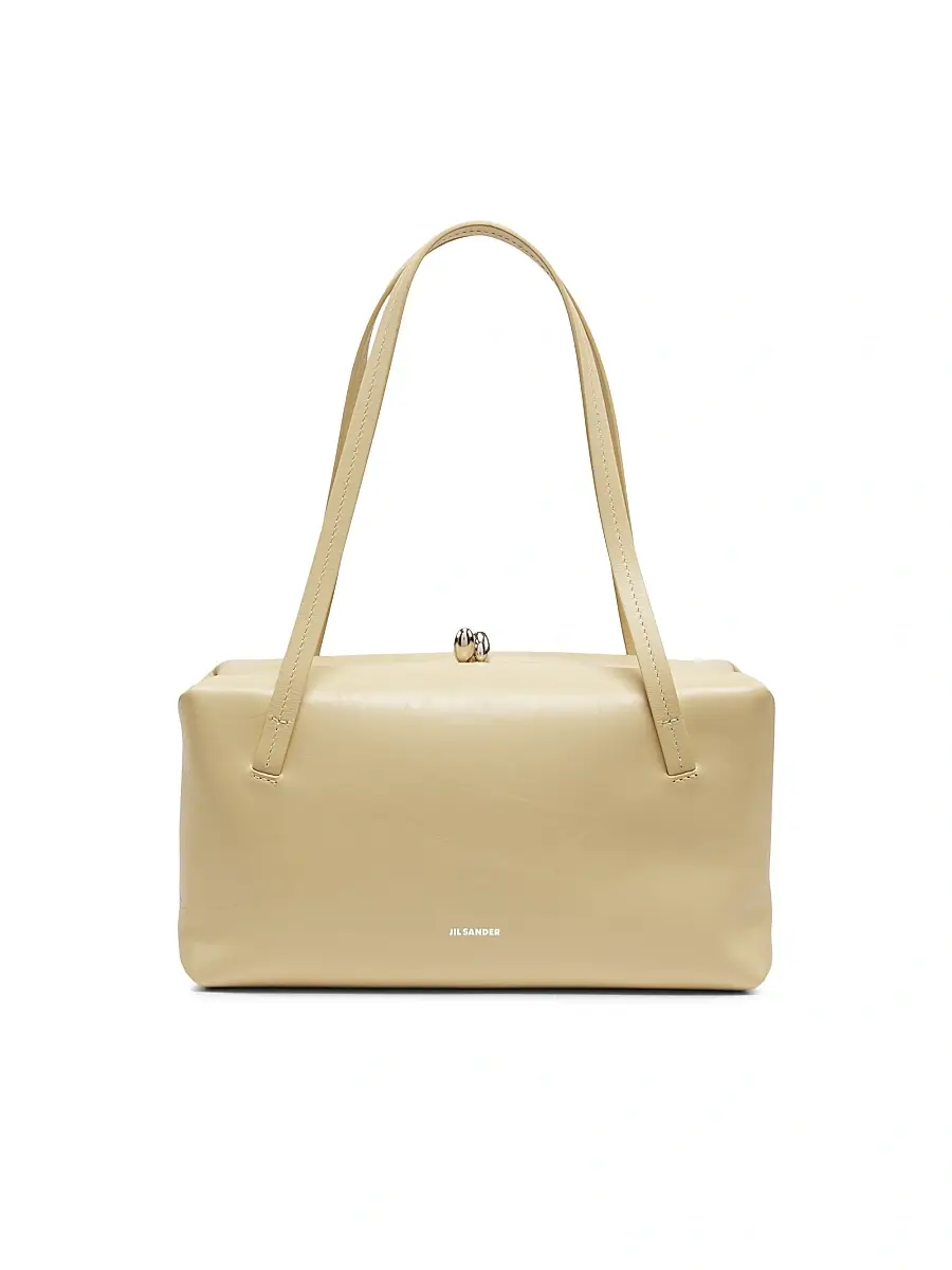 Jil Sander Women's Goji Pillow Leather Handle Bag - Almond Butter | Image 1 Jil Sander Women's Goji Pillow Leather Handle Bag - Almond Butter | Image 1