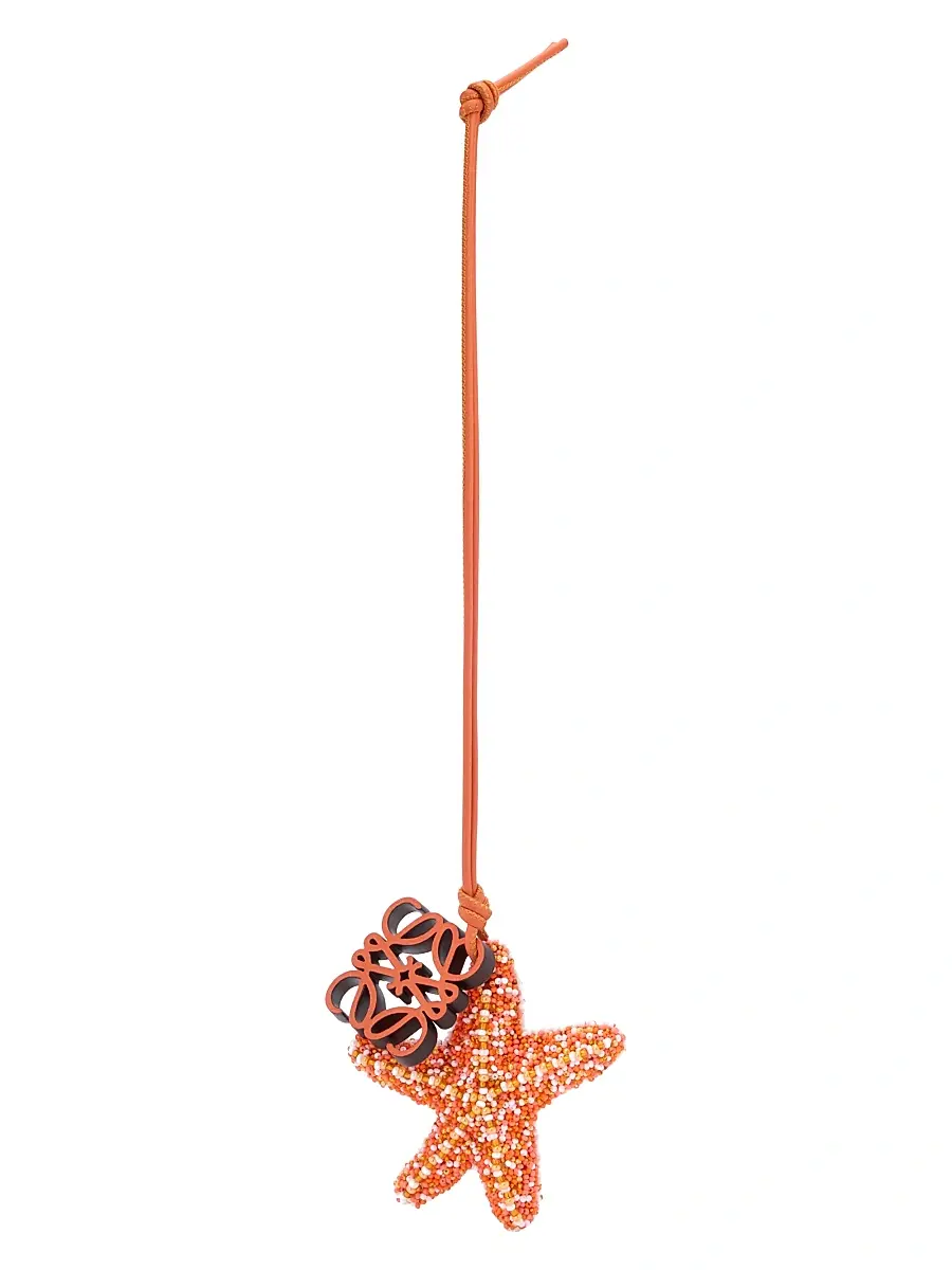 LOEWE Women's x Paula's Ibiza Anagram Star Charm - Orange | Image 1 LOEWE Women's x Paula's Ibiza Anagram Star Charm - Orange | Image 1