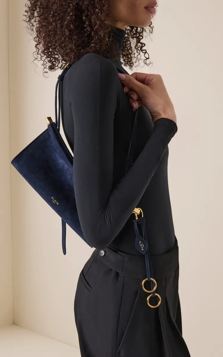 ALAÏA Le Click E/W Suede Shoulder Bag | Thumbnail 2 ALAÏA Le Click E/W Suede Shoulder Bag | Thumbnail 2