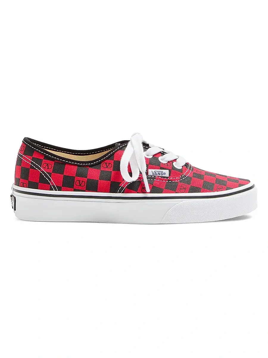 Valentino Garavani and Vans Women's Low-Top Sneakers - Rouge Pur Black | Image 1 Valentino Garavani and Vans Women's Low-Top Sneakers - Rouge Pur Black | Image 1