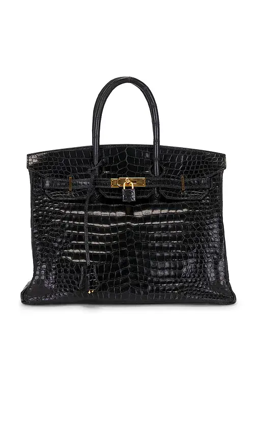 HERMÈS Shiny Porosus Crocodile Birkin 35 Handbag | Image 1 HERMÈS Shiny Porosus Crocodile Birkin 35 Handbag | Image 1