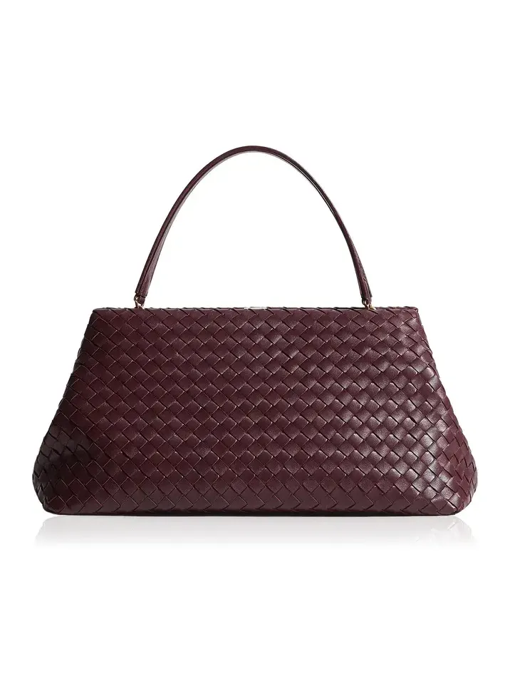 The 1998 Intrecciato Leather Clutch The 1998 Intrecciato Leather Clutch