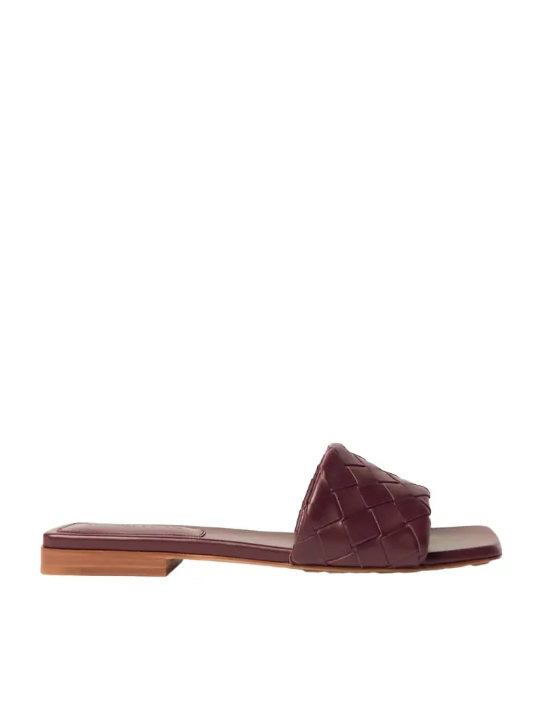 Bottega Veneta Parco Intrecciato Leather Slides | Image 1 Bottega Veneta Parco Intrecciato Leather Slides | Image 1