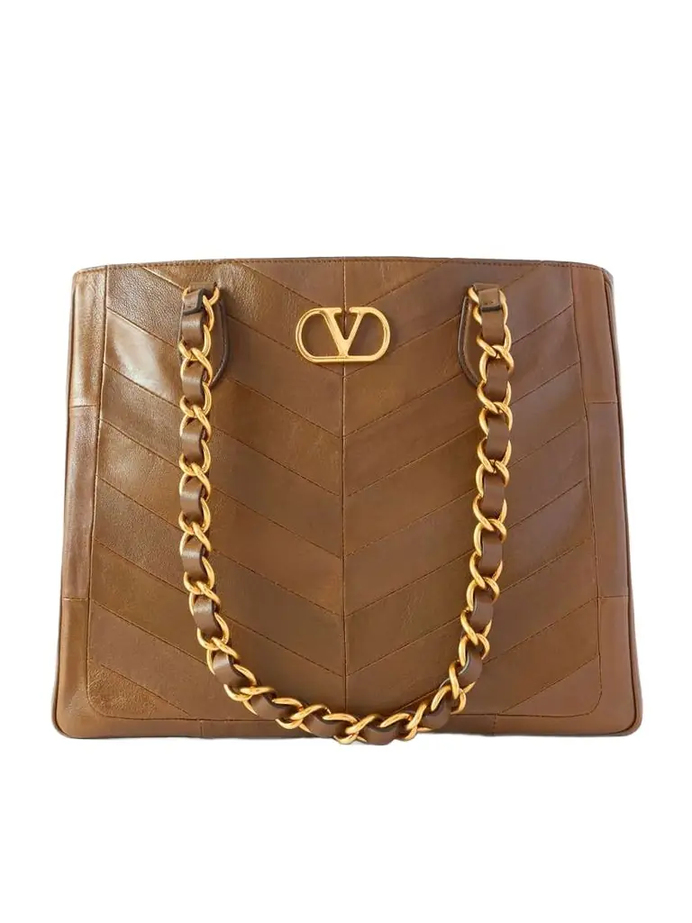Valentino Garavani Jean Chain-detailed Paneled Leather Tote | Image 1 Valentino Garavani Jean Chain-detailed Paneled Leather Tote | Image 1