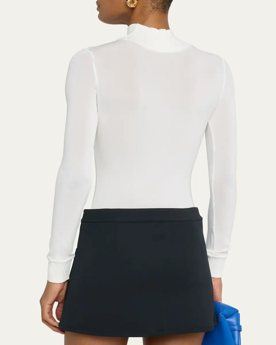 Courrèges Re-Edition Mock-Neck Long-Sleeve Fitted Top | Thumbnail 9 Courrèges Re-Edition Mock-Neck Long-Sleeve Fitted Top | Thumbnail 9