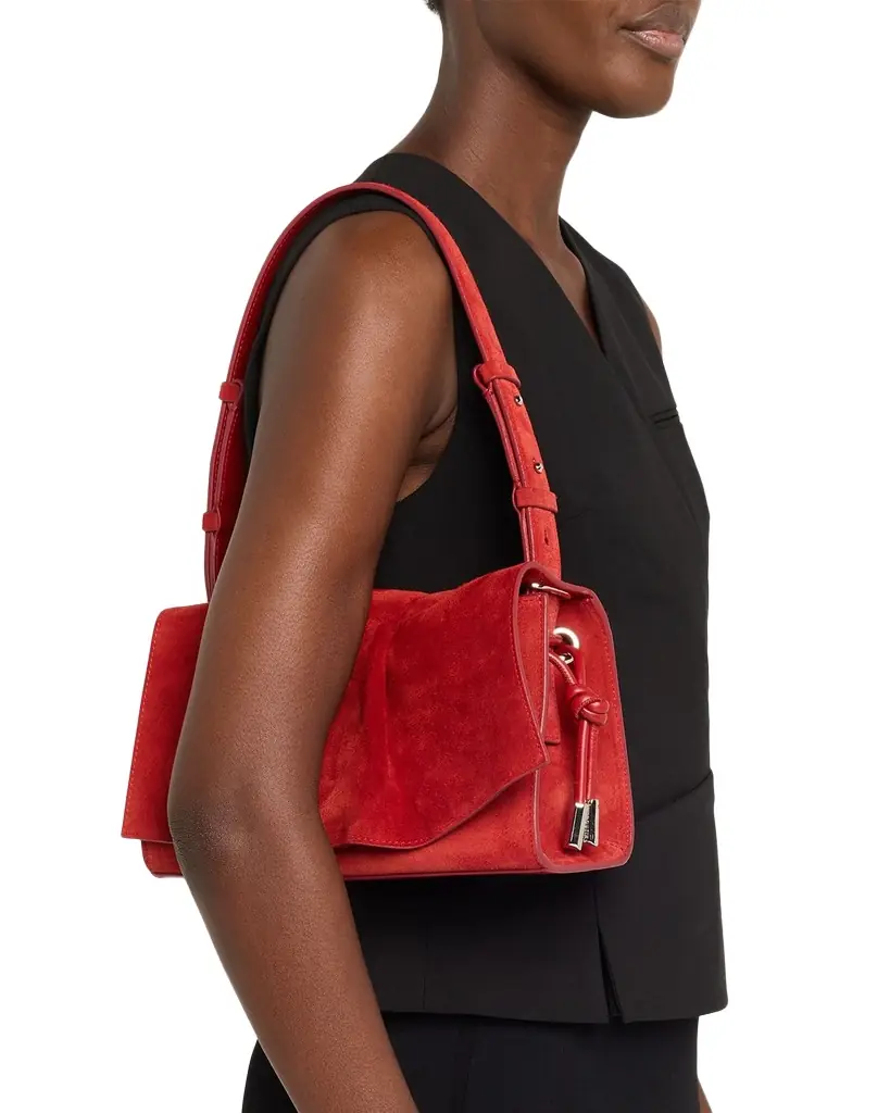 Christian Louboutin Baggy Small Shoulder Bag in Suede | Image 1 Christian Louboutin Baggy Small Shoulder Bag in Suede | Image 1