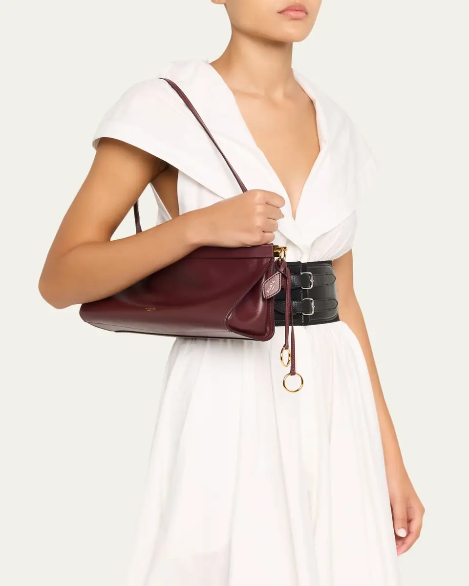 ALAÏA Le Click Medium Shoulder Bag in Glossy Leather | Thumbnail 11 ALAÏA Le Click Medium Shoulder Bag in Glossy Leather | Thumbnail 11