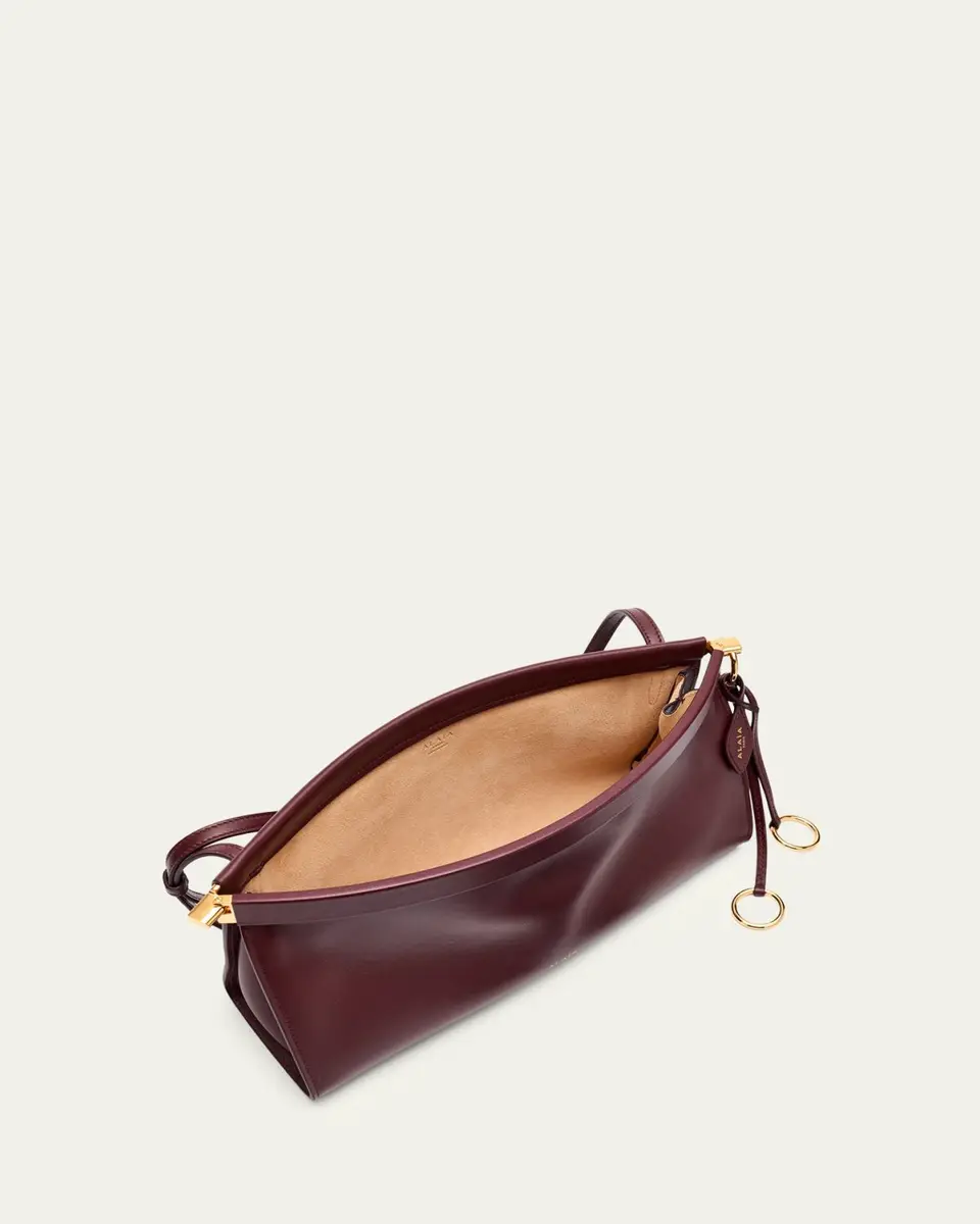 ALAÏA Le Click Medium Shoulder Bag in Glossy Leather | Thumbnail 13 ALAÏA Le Click Medium Shoulder Bag in Glossy Leather | Thumbnail 13