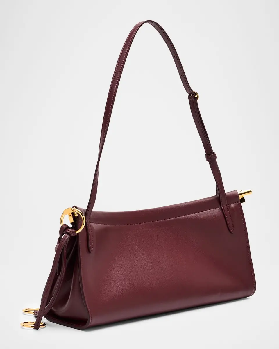 ALAÏA Le Click Medium Shoulder Bag in Glossy Leather | Thumbnail 16 ALAÏA Le Click Medium Shoulder Bag in Glossy Leather | Thumbnail 16