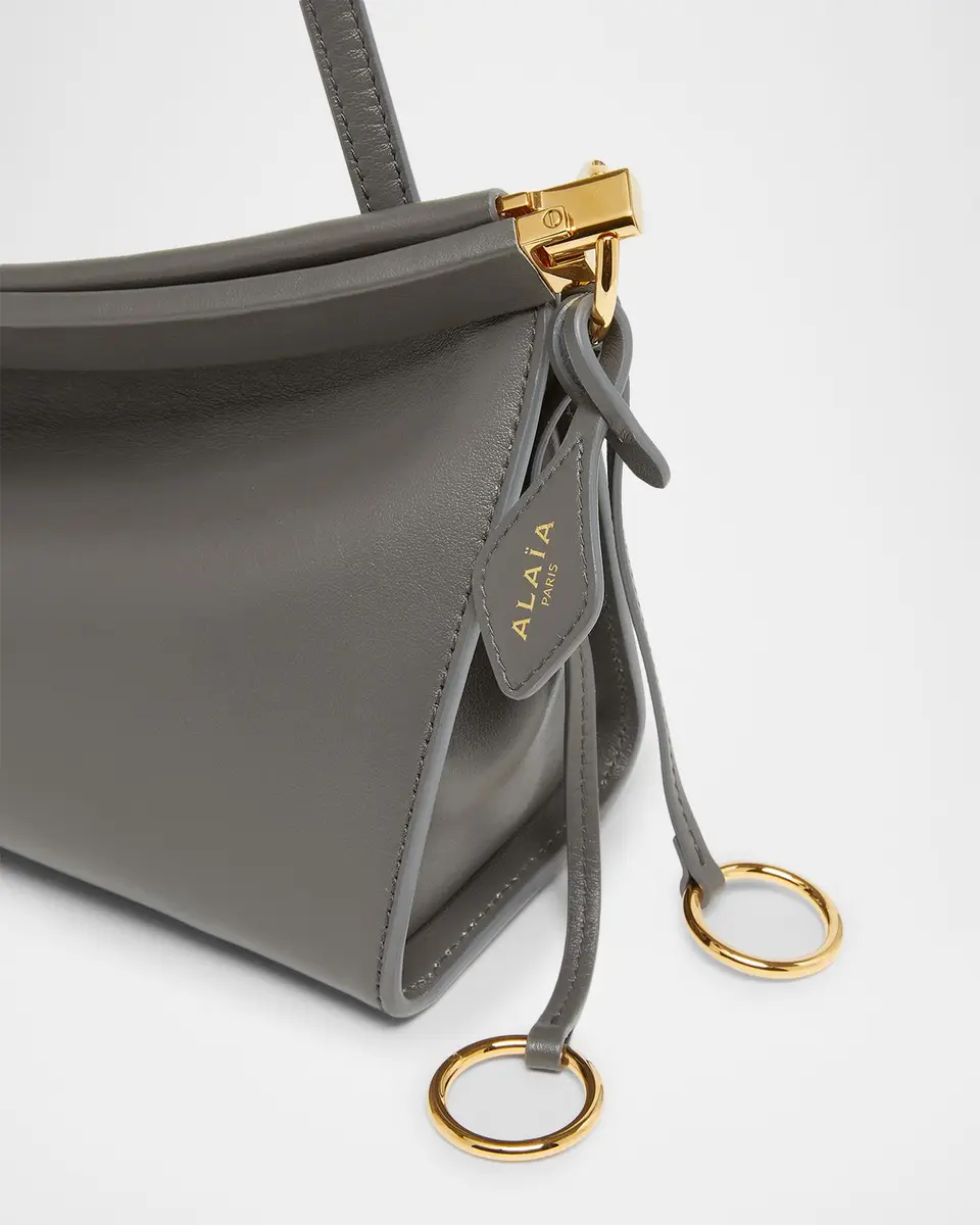 ALAÏA Le Click Medium Shoulder Bag in Glossy Leather | Thumbnail 24 ALAÏA Le Click Medium Shoulder Bag in Glossy Leather | Thumbnail 24