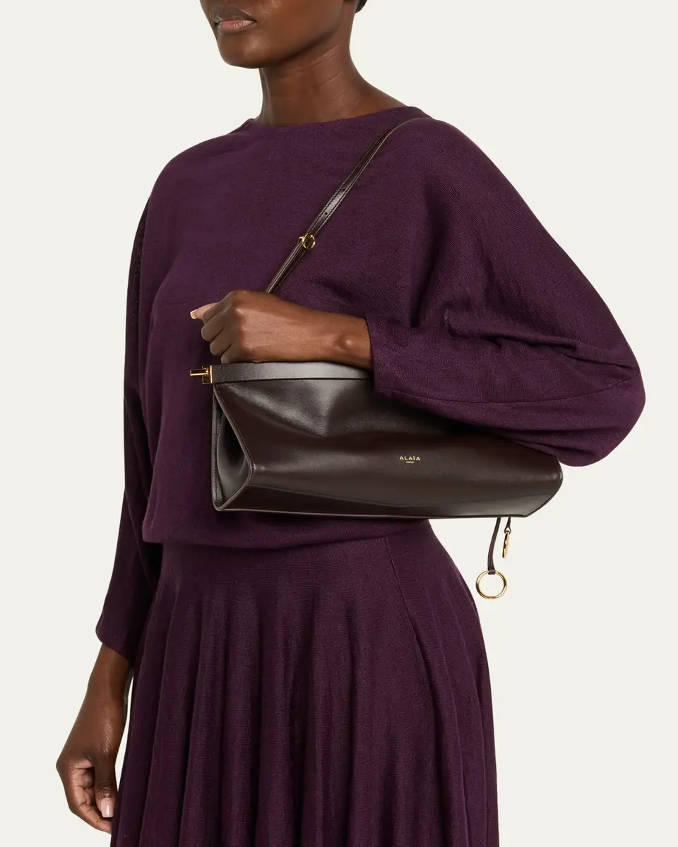 ALAÏA Le Click Medium Shoulder Bag in Glossy Leather | Thumbnail 25 ALAÏA Le Click Medium Shoulder Bag in Glossy Leather | Thumbnail 25