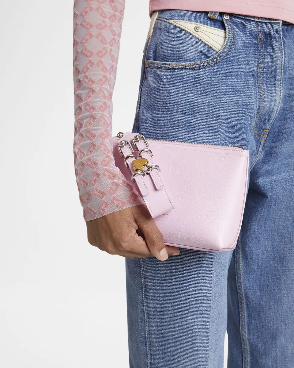 Givenchy Voyou Small Pouch Bag in Leather with Buckle and Heart Lock Wristlet | Image 1 Givenchy Voyou Small Pouch Bag in Leather with Buckle and Heart Lock Wristlet | Image 1