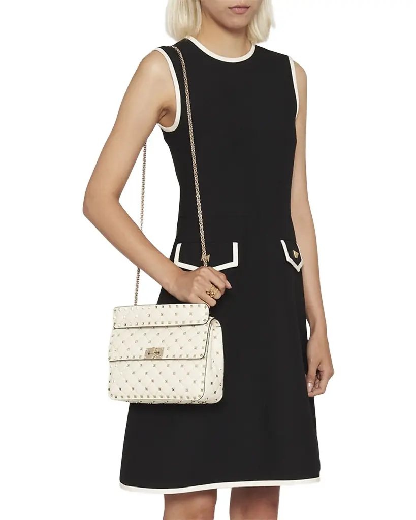 Valentino Garavani Rockstud Spike Medium Quilted Top-Handle Bag | Image 1 Valentino Garavani Rockstud Spike Medium Quilted Top-Handle Bag | Image 1