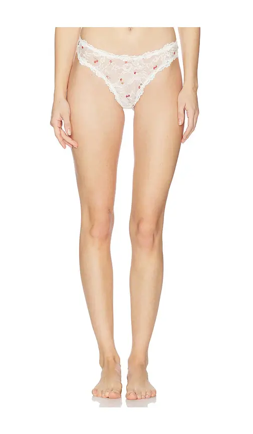SKIMS Stretch Lace Dipped Thong | Image 1 SKIMS Stretch Lace Dipped Thong | Image 1