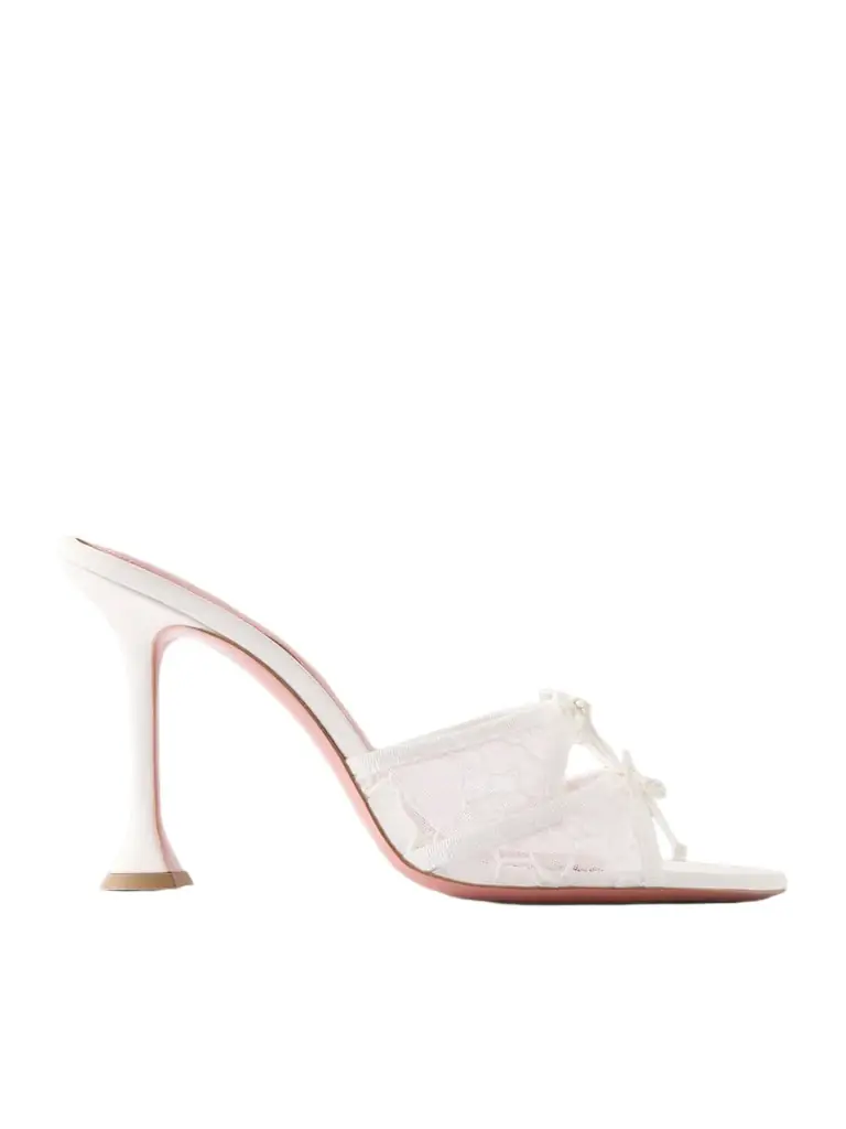 Amina Muaddi Eleonora Bow-detailed Lace And Leather Mules | Image 1 Amina Muaddi Eleonora Bow-detailed Lace And Leather Mules | Image 1