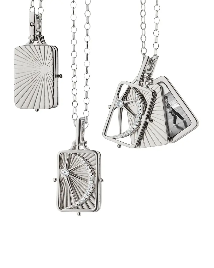Monica Rich Kosann Sterling Silver Rectangular Sun, Moon, and Stars Gate Frame Necklace with Two Image Cases on a 32" Chain | Image 1 Monica Rich Kosann Sterling Silver Rectangular Sun, Moon, and Stars Gate Frame Necklace with Two Image Cases on a 32" Chain | Image 1