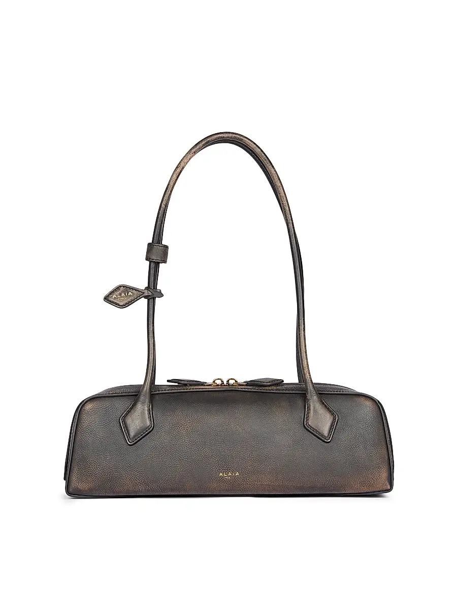 Alaïa Women's Le Teckel Distressed Leather Shoulder Bag - Ebene | Image 1 Alaïa Women's Le Teckel Distressed Leather Shoulder Bag - Ebene | Image 1