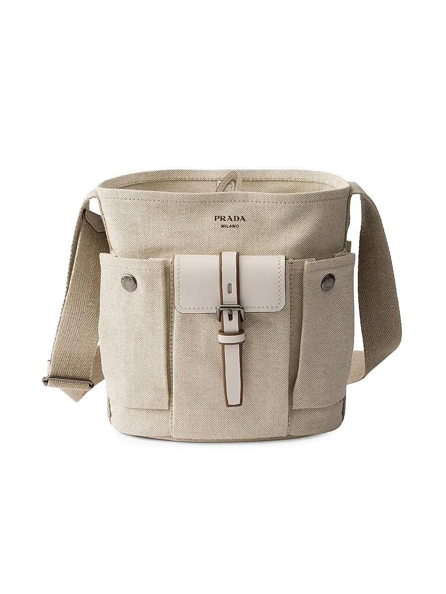 Prada Women's Route Mini Canvas and Leather Bucket Bag - Beige Khaki | Image 1 Prada Women's Route Mini Canvas and Leather Bucket Bag - Beige Khaki | Image 1