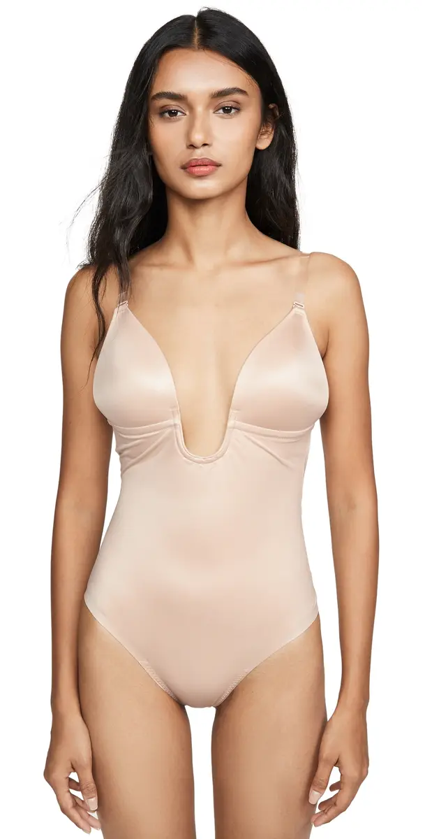 SPANX shape Suit Your Fancy Plunge Low-Back Thong Bodysuit Champagne Beige | Image 1 SPANX shape Suit Your Fancy Plunge Low-Back Thong Bodysuit Champagne Beige | Image 1