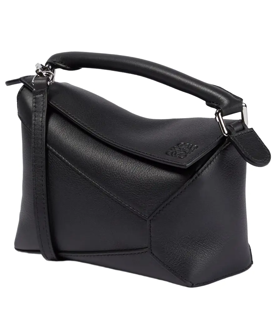 Loewe Puzzle Edge Mini leather top-handle bag | Image 1 Loewe Puzzle Edge Mini leather top-handle bag | Image 1