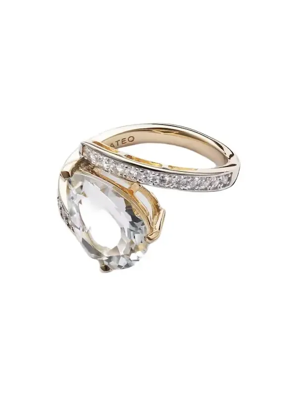 Slanted 14kt gold ring with topaz and diamonds Slanted 14kt gold ring with topaz and diamonds