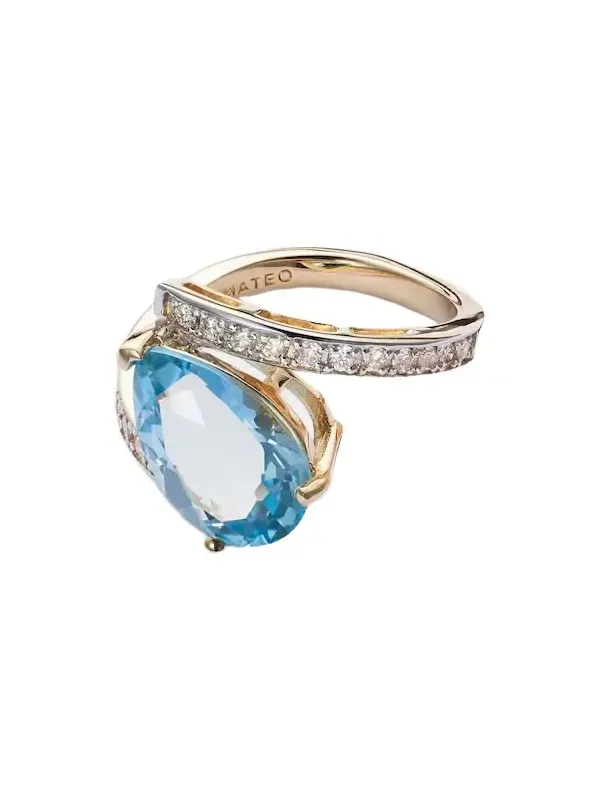 Slanted 14kt gold ring with topaz and diamonds Slanted 14kt gold ring with topaz and diamonds