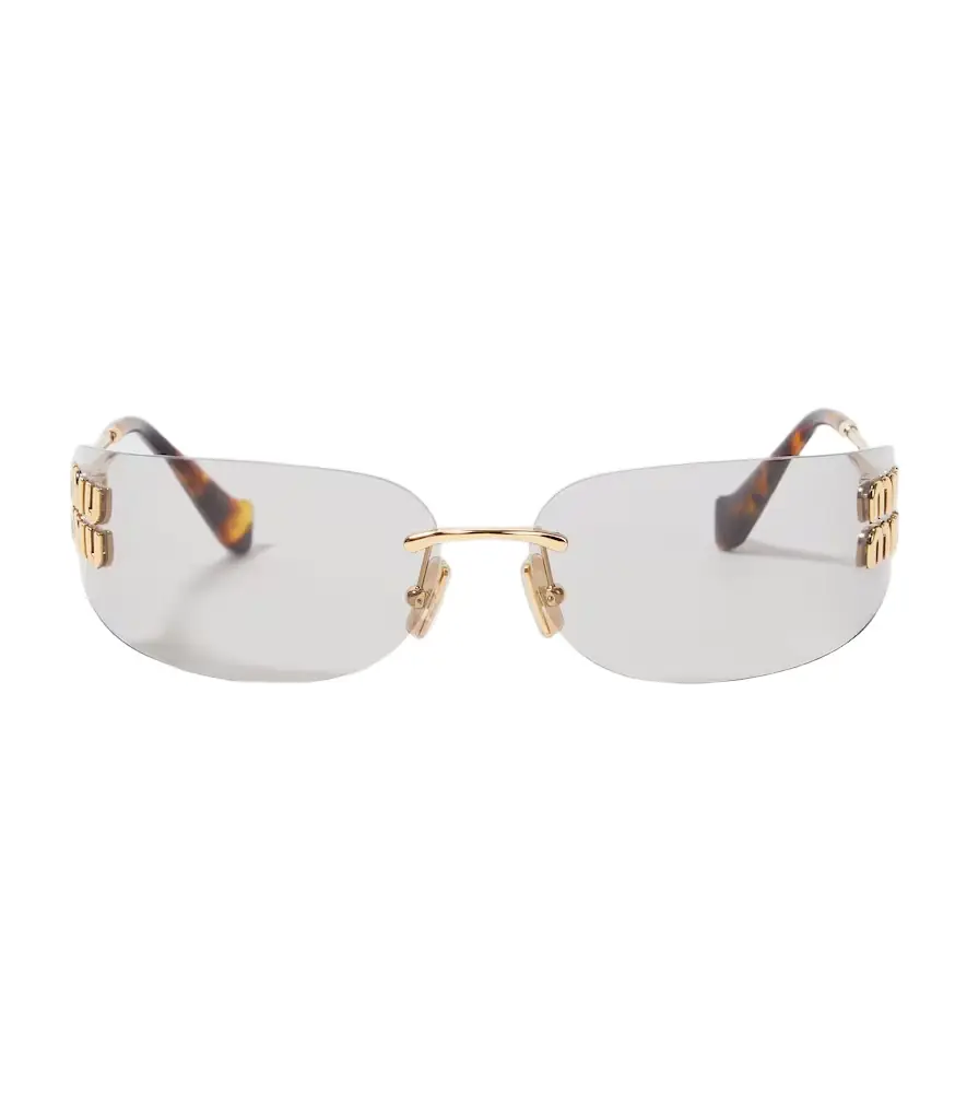 Miu Miu Logo oval sunglasses | Image 1 Miu Miu Logo oval sunglasses | Image 1