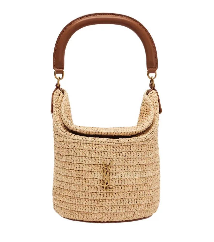 Saint Laurent Gaby leather-trimmed raffia bucket bag | Image 1 Saint Laurent Gaby leather-trimmed raffia bucket bag | Image 1