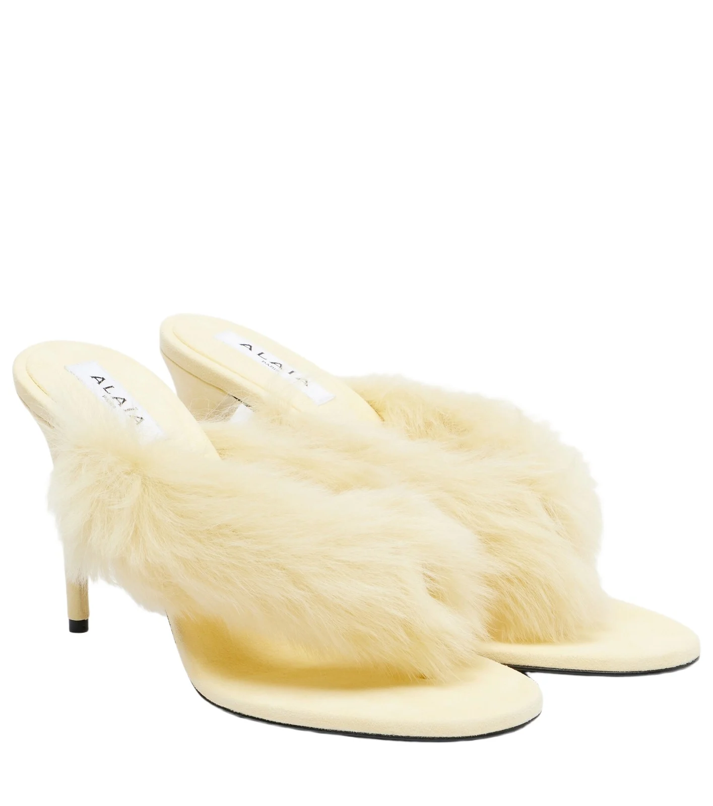 ALAÏA Shearling and leather thong sandals