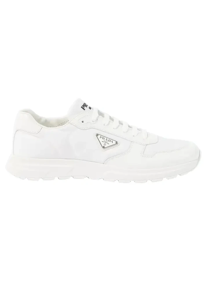 Logo leather-trimmed sneakers Logo leather-trimmed sneakers