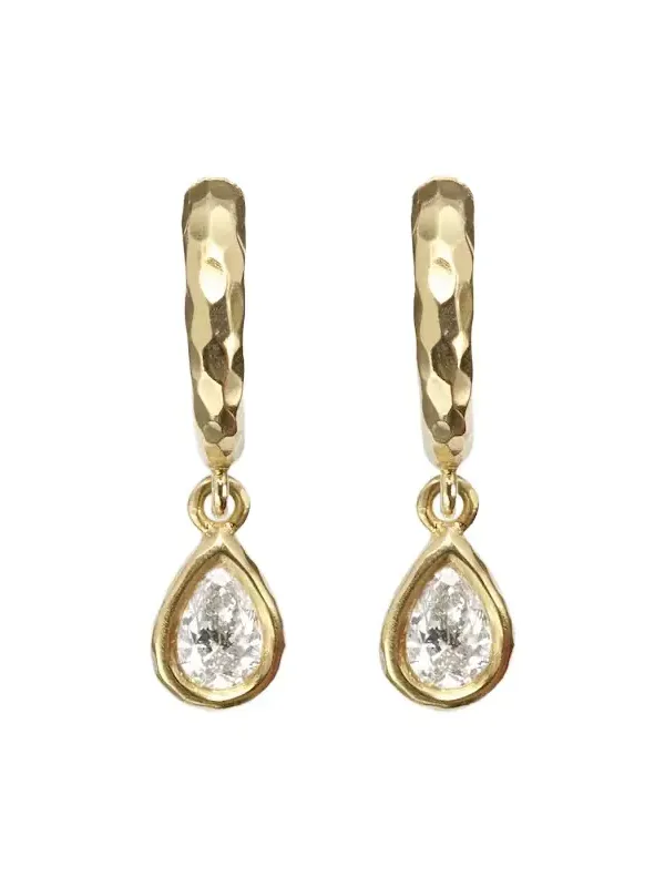 Hidden Gem 18kt gold huggie earrings with diamonds