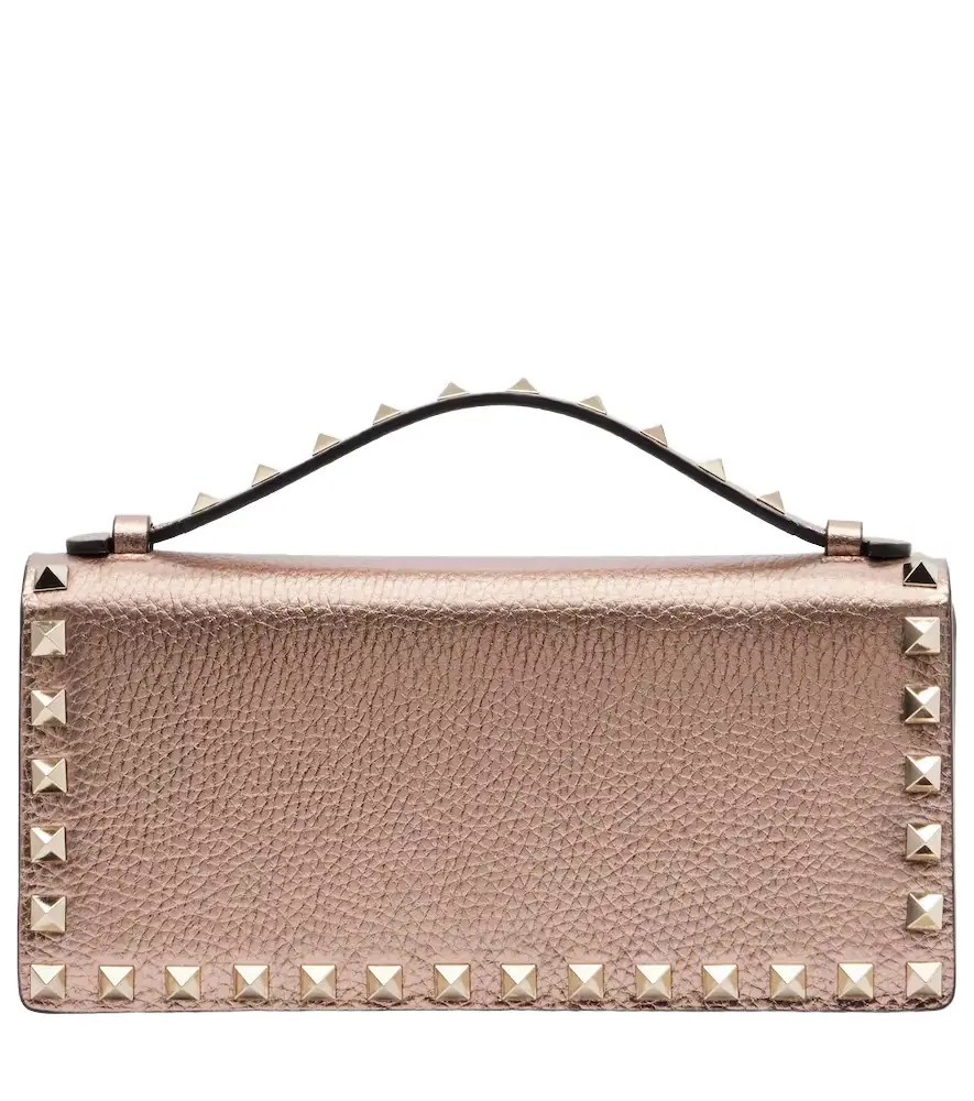 Valentino Garavani Rockstud Mini metallic leather crossbody bag | Image 1 Valentino Garavani Rockstud Mini metallic leather crossbody bag | Image 1