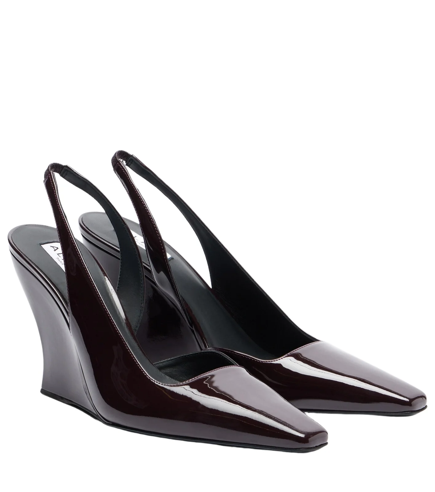 ALAÏA ALAÏA Patent leather wedge slingback pumps