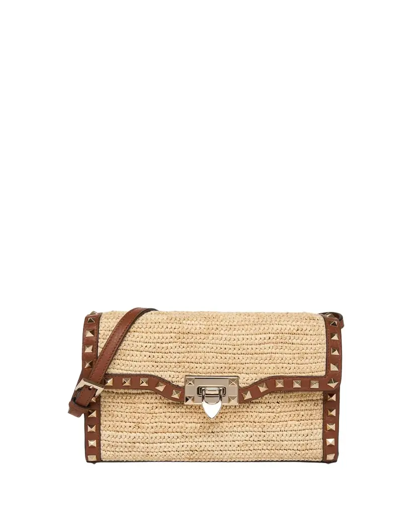 Valentino Garavani Small Rockstud-Trim Viscose Raffia Crossbody Bag | Image 1 Valentino Garavani Small Rockstud-Trim Viscose Raffia Crossbody Bag | Image 1