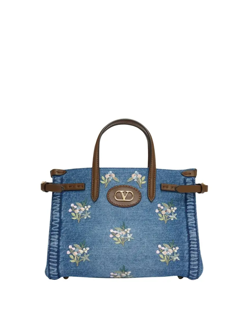 Valentino Garavani Antibes Small Floral-Embroidered Denim Tote Bag | Image 1 Valentino Garavani Antibes Small Floral-Embroidered Denim Tote Bag | Image 1