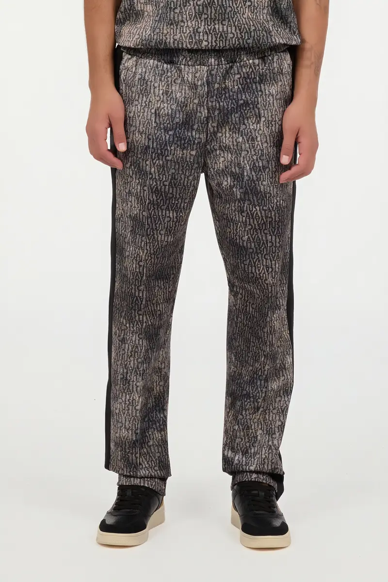 Roberto Cavalli Faded Effect Trousers With All-Over Lettering | Thumbnail 2 Roberto Cavalli Faded Effect Trousers With All-Over Lettering | Thumbnail 2