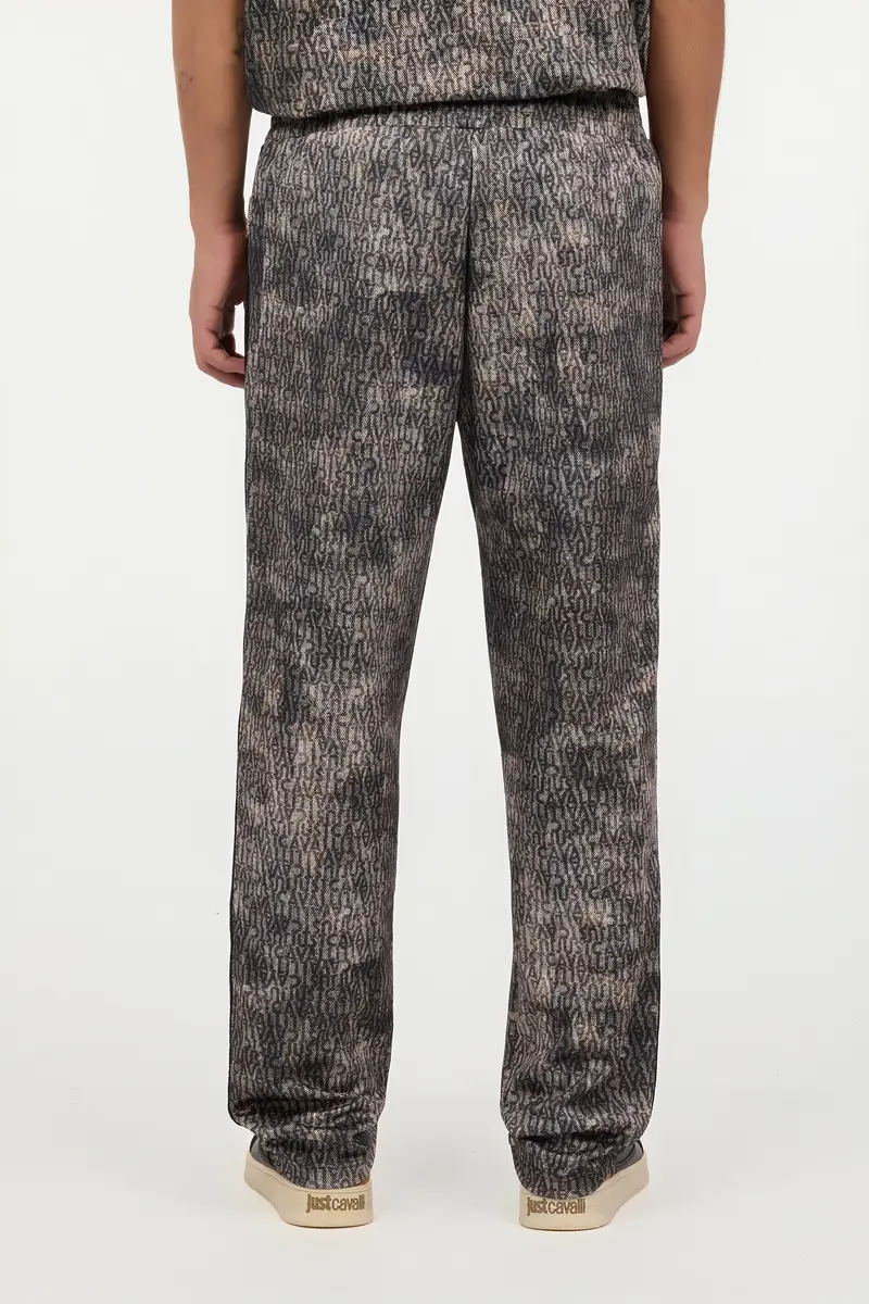 Roberto Cavalli Faded Effect Trousers With All-Over Lettering | Thumbnail 3 Roberto Cavalli Faded Effect Trousers With All-Over Lettering | Thumbnail 3