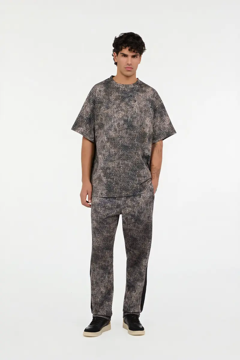 Roberto Cavalli Faded Effect Trousers With All-Over Lettering | Thumbnail 7 Roberto Cavalli Faded Effect Trousers With All-Over Lettering | Thumbnail 7