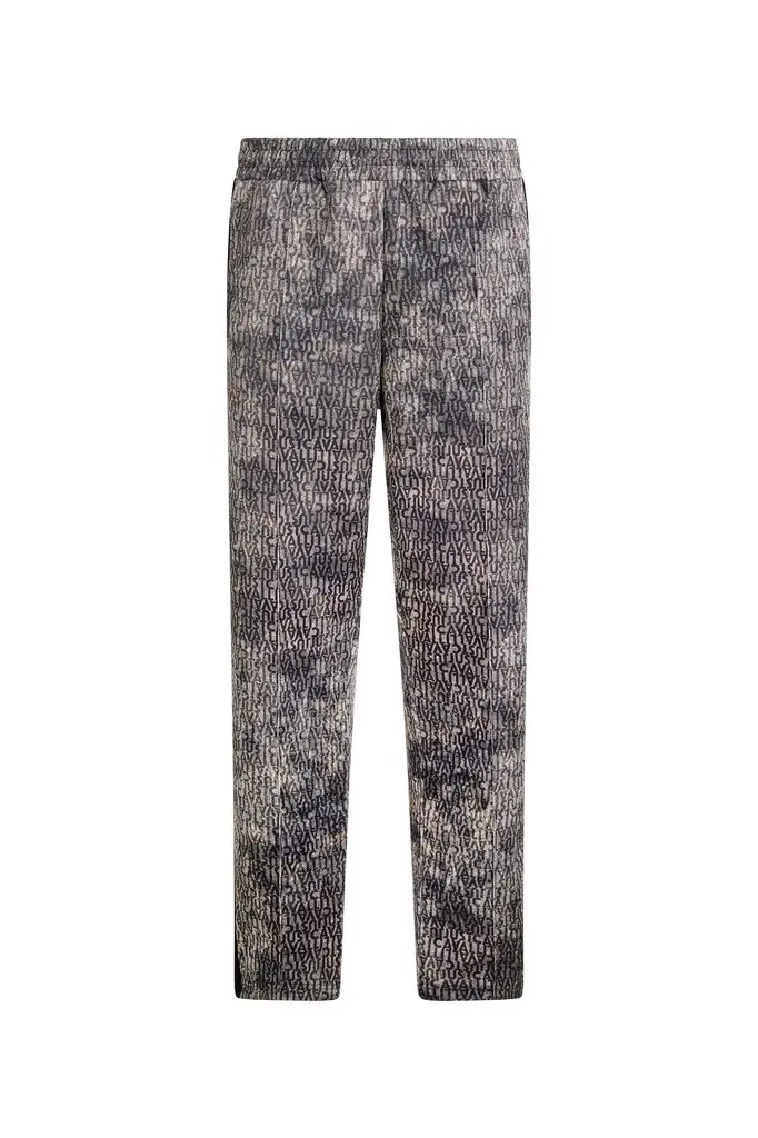 Roberto Cavalli Faded Effect Trousers With All-Over Lettering | Image 1 Roberto Cavalli Faded Effect Trousers With All-Over Lettering | Image 1