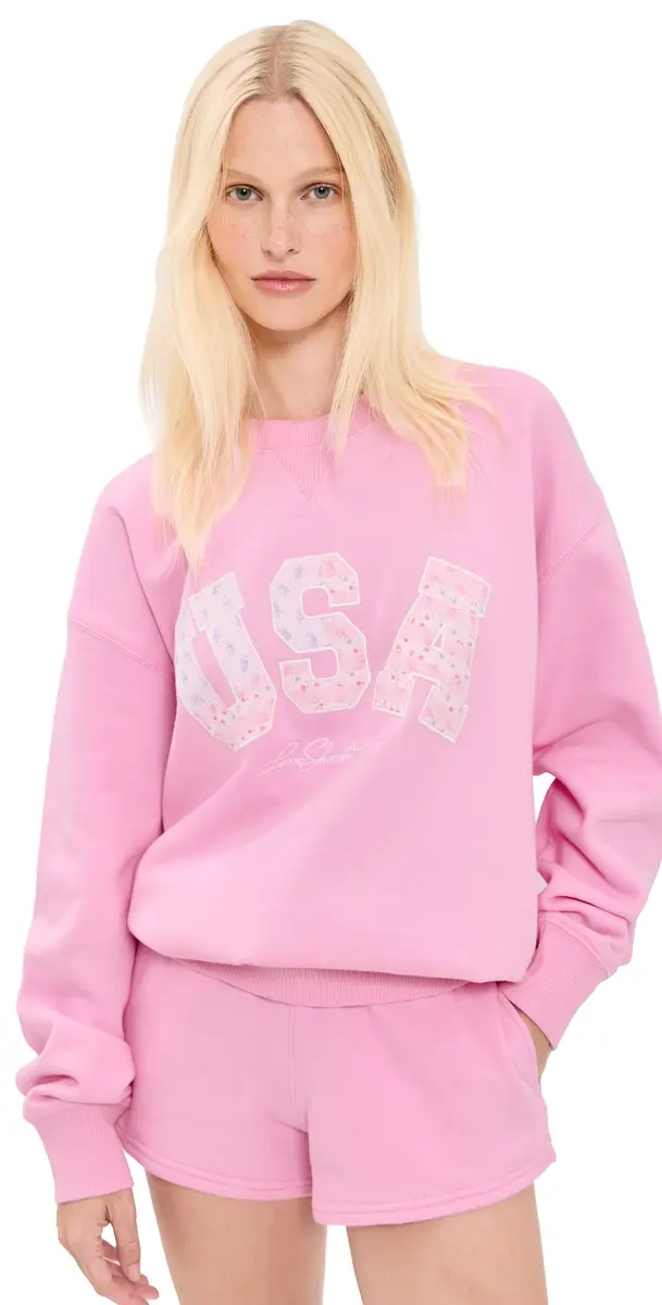 LoveShackFancy Palo USA Fleece Pullover Sunbeam Pink | Image 1 LoveShackFancy Palo USA Fleece Pullover Sunbeam Pink | Image 1