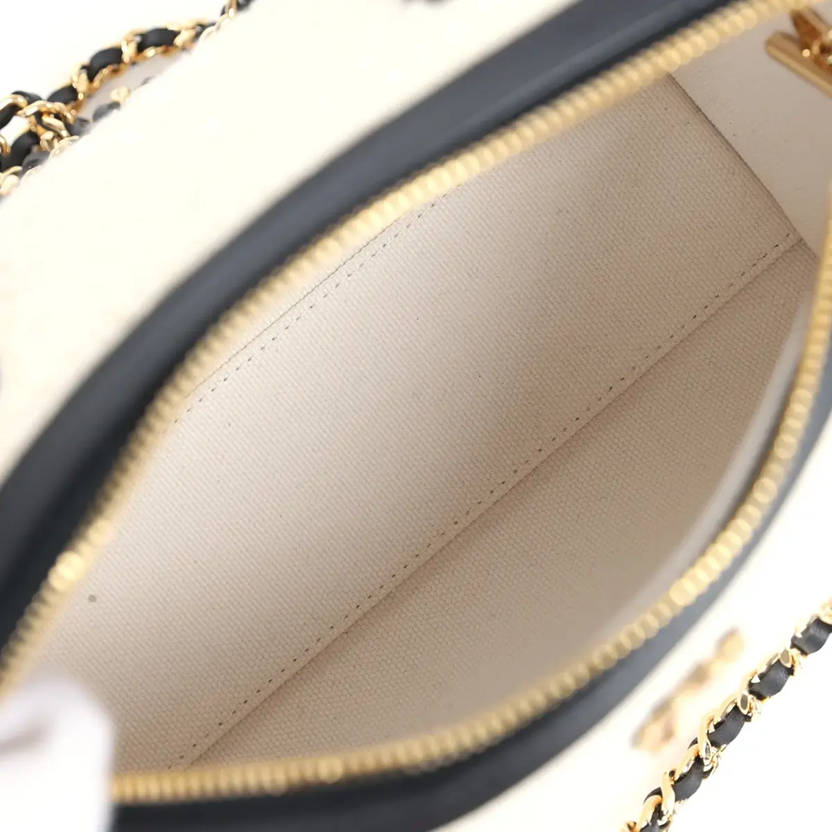 Chanel Chanel Coco Beach Mini Timeless Classic Barrel Bag with Chain Ecru Tweed and Black Calfskin Gold Hardware | Thumbnail 8 Chanel Chanel Coco Beach Mini Timeless Classic Barrel Bag with Chain Ecru Tweed and Black Calfskin Gold Hardware | Thumbnail 8