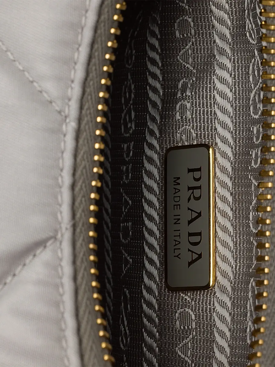 Prada Women's Re-Edition Quilted Re-Nylon Mini Shoulder Bag - Light Grey | Thumbnail 4 Prada Women's Re-Edition Quilted Re-Nylon Mini Shoulder Bag - Light Grey | Thumbnail 4