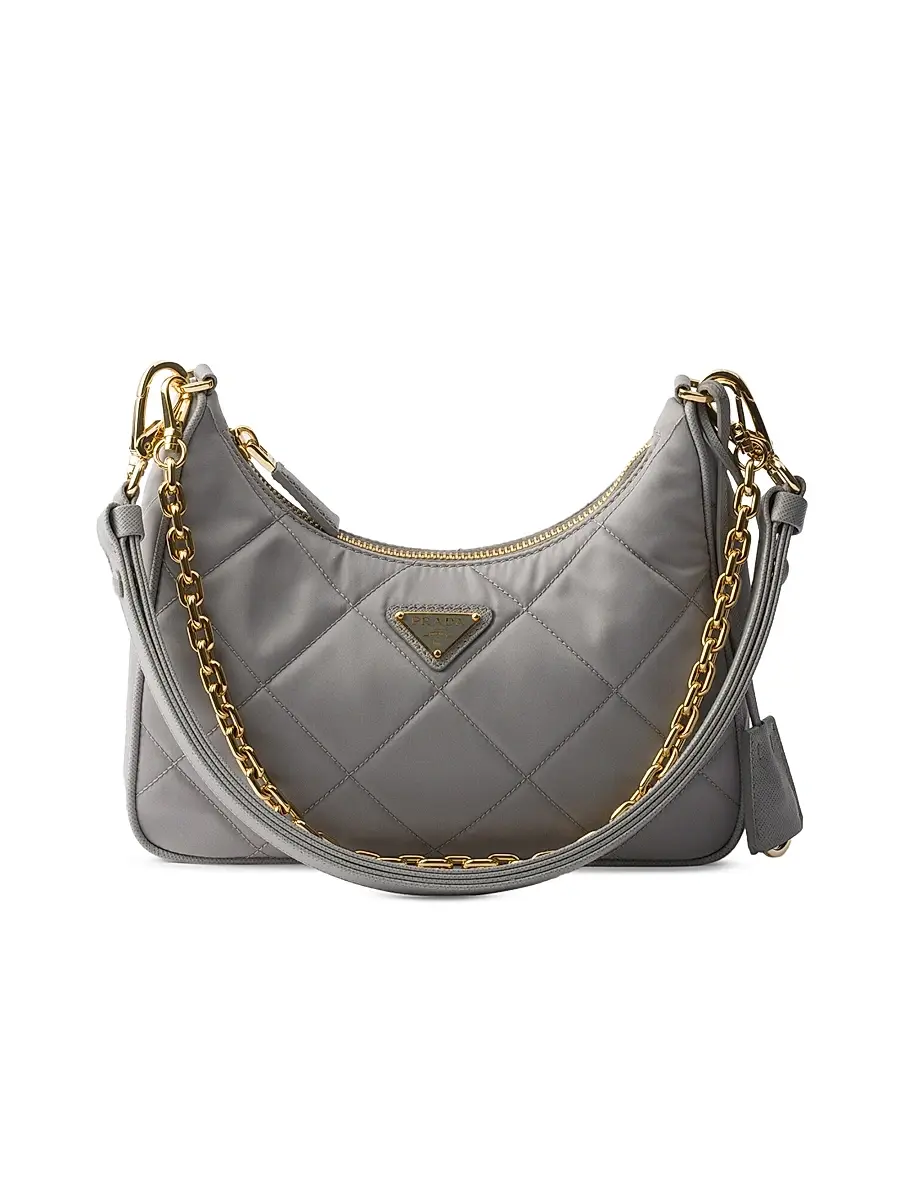 Prada Women's Re-Edition Quilted Re-Nylon Mini Shoulder Bag - Light Grey | Image 1 Prada Women's Re-Edition Quilted Re-Nylon Mini Shoulder Bag - Light Grey | Image 1