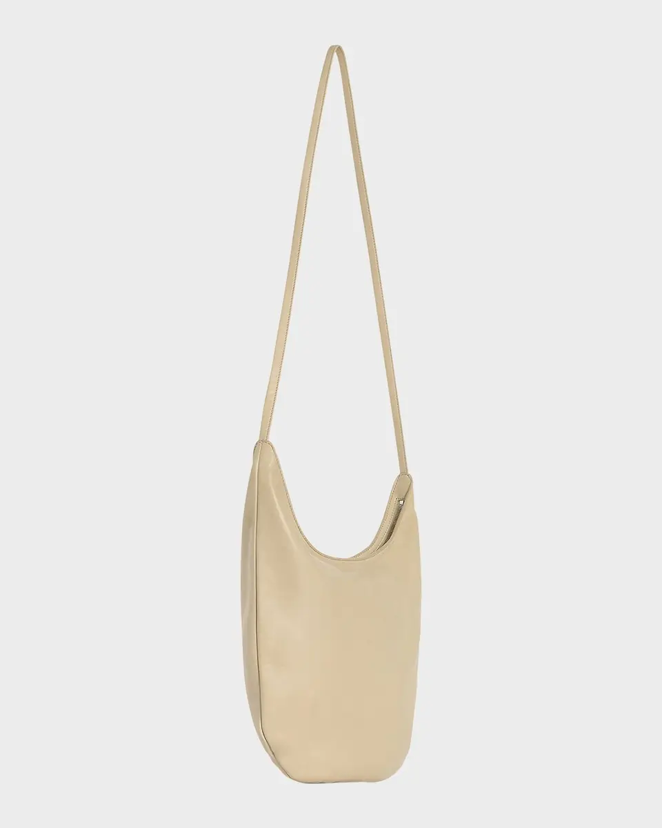 THE ROW Izzy North-South Crossbody Bag in Silky Leather | Thumbnail 2 THE ROW Izzy North-South Crossbody Bag in Silky Leather | Thumbnail 2