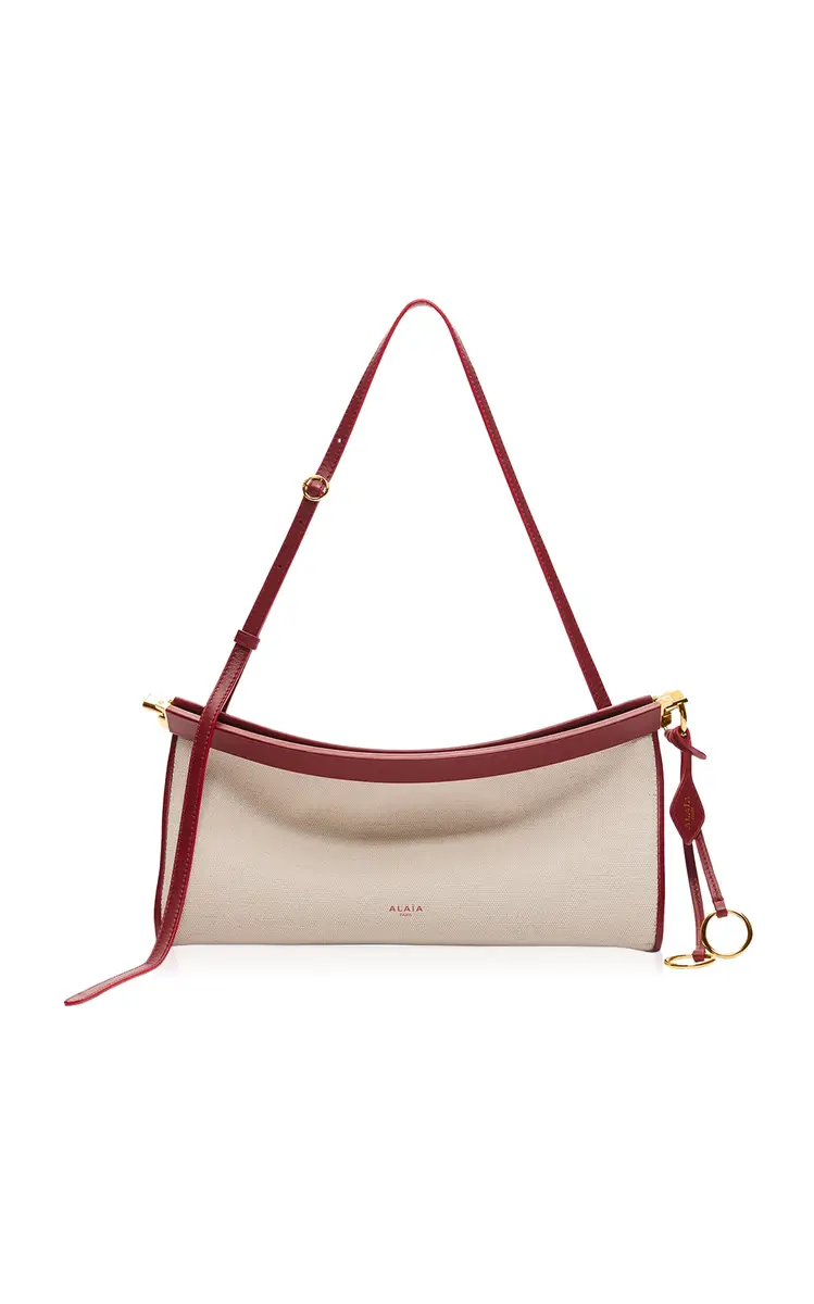Alaïa Le Click E/W Leather-Trimmed Bag | Thumbnail 4 Alaïa Le Click E/W Leather-Trimmed Bag | Thumbnail 4